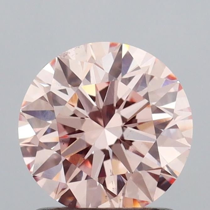 Ideal Loose Diamond - ROUND 1.16ct Fancy Brownish Pink VS2: Ideal Loose Diamond - ROUND 1.16ct Fancy Brownish Pink VS2 Source: This is a real non-mined Diamond that has been grown in a lab Shape: ROUND Carats: 1.16 Color: Fancy Brownish Pink Certification: IGI