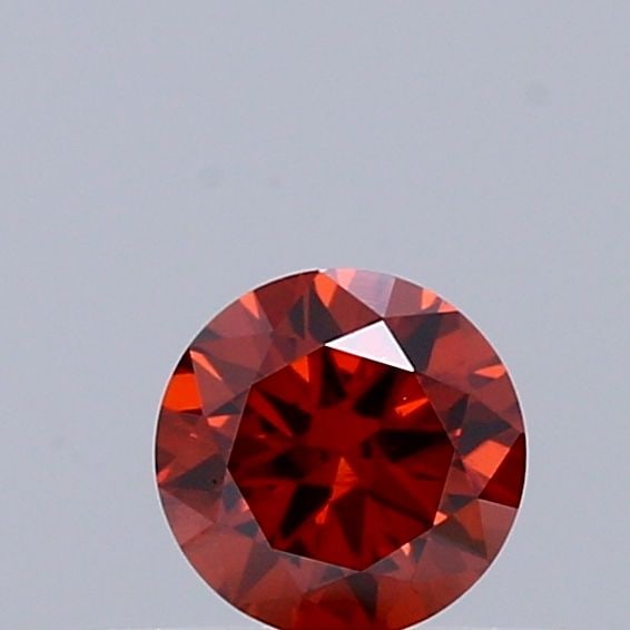 Loose Diamond - ROUND 0.28ct Fancy Deep Orange VS1: Loose Diamond - ROUND 0.28ct Fancy Deep Orange VS1 Source: This is a real non-mined Diamond that has been grown in a lab Shape: ROUND Carats: 0.28 Color: Fancy Deep Orange Certification: IGI Video:
