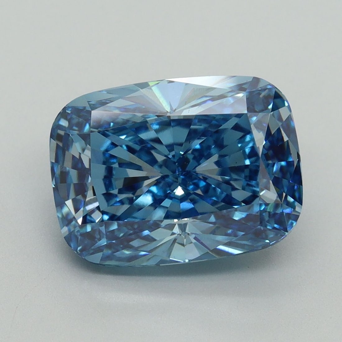 Loose Diamond - CUSHION BRILLIANT 5.08ct Fancy Vivid Blue VS1: Loose Diamond - CUSHION BRILLIANT 5.08ct Fancy Vivid Blue VS1 Source: This is a real non-mined Diamond that has been grown in a lab Shape: CUSHION BRILLIANT Carats: 5.08 Color: Fancy Vivid Blue Certif