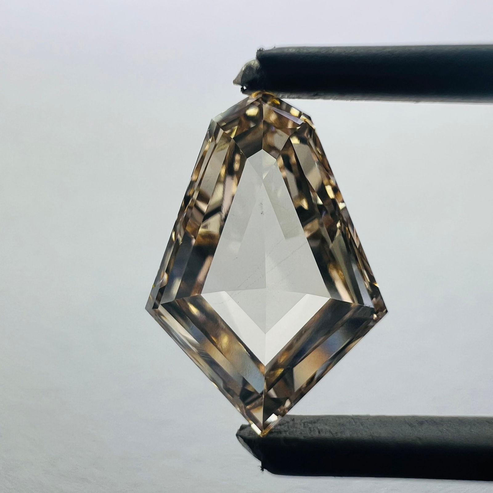 Loose Diamond - KITE 2.01ct Orange VS2: Loose Diamond - KITE 2.01ct Orange VS2 Source: This is a real non-mined Diamond that has been grown in a lab Shape: KITE Carats: 2.01 Color: Orange Certification: NONE The Diamond Depot Guarantee: All