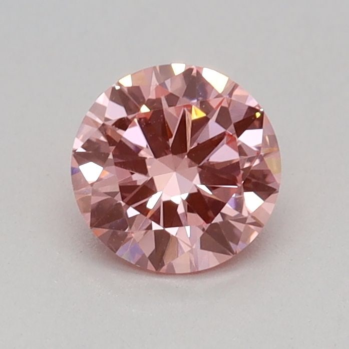 Loose Diamond - ROUND 0.32ct Fancy Vivid Pink VVS2: Loose Diamond - ROUND 0.32ct Fancy Vivid Pink VVS2 Source: This is a real non-mined Diamond that has been grown in a lab Shape: ROUND Carats: 0.32 Color: Fancy Vivid Pink Certification: IGI Video: