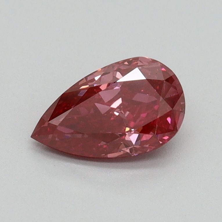 Loose Diamond - PEAR 0.62ct Fancy Vivid Red VS2: Loose Diamond - PEAR 0.62ct Fancy Vivid Red VS2 Source: This is a real non-mined Diamond that has been grown in a lab Shape: PEAR Carats: 0.62 Color: Fancy Vivid Red Certification: IGI Video: