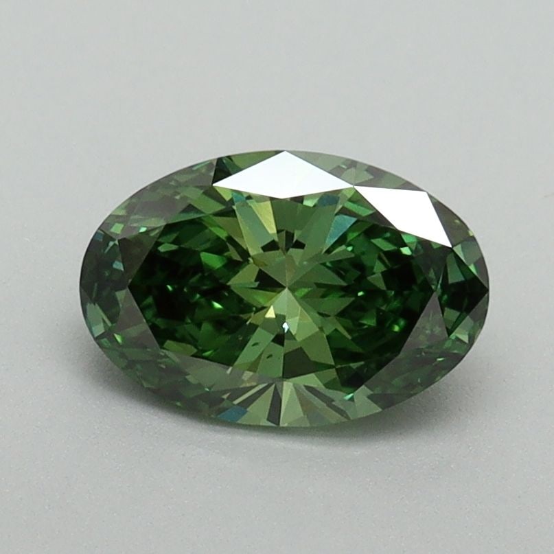Loose Diamond - OVAL 0.9ct Fancy Vivid Green VS1: Loose Diamond - OVAL 0.9ct Fancy Vivid Green VS1 Source: This is a real non-mined Diamond that has been grown in a lab Shape: OVAL Carats: 0.9 Color: Fancy Vivid Green Certification: IGI Video: