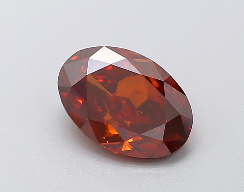 Loose Diamond - OVAL 1.53ct Fancy Orange VS2: Loose Diamond - OVAL 1.53ct Fancy Orange VS2 Source: This is a real non-mined Diamond that has been grown in a lab Shape: OVAL Carats: 1.53 Color: Fancy Orange Certification: IGI Video: