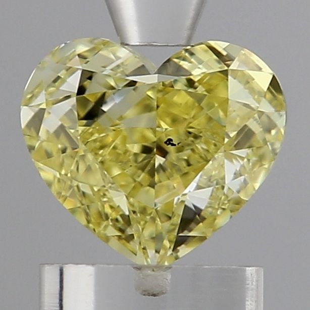 Loose Diamond - HEART 1.19ct Fancy Vivid Yellow VS1: Loose Diamond - HEART 1.19ct Fancy Vivid Yellow VS1 Source: This is a real non-mined Diamond that has been grown in a lab Shape: HEART Carats: 1.19 Color: Fancy Vivid Yellow Certification: IGI Video: