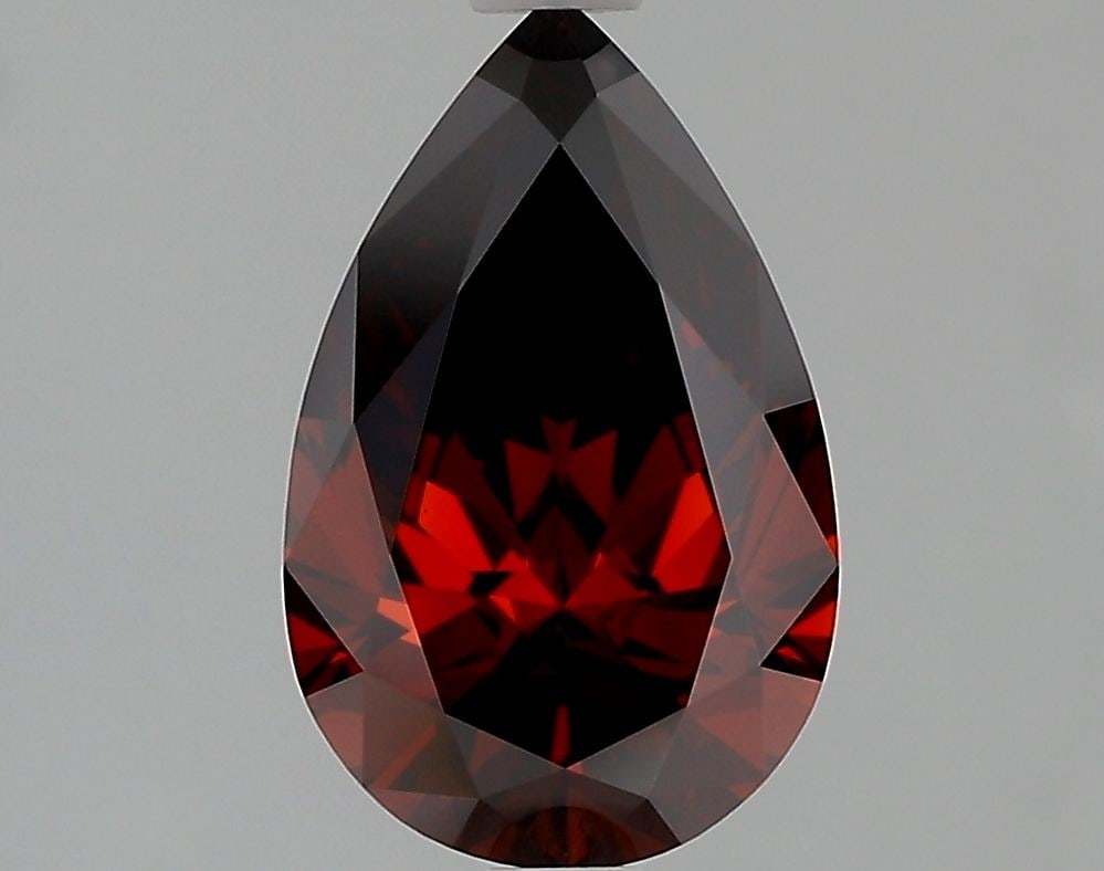 Loose Diamond - PEAR 1.55ct Fancy Deep Orange VVS2: Loose Diamond - PEAR 1.55ct Fancy Deep Orange VVS2 Source: This is a real non-mined Diamond that has been grown in a lab Shape: PEAR Carats: 1.55 Color: Fancy Deep Orange Certification: IGI Video: