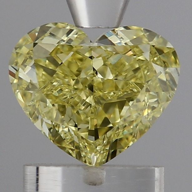 Loose Diamond - HEART 1.21ct Fancy Intense Yellow VS1: Loose Diamond - HEART 1.21ct Fancy Intense Yellow VS1 Source: This is a real non-mined Diamond that has been grown in a lab Shape: HEART Carats: 1.21 Color: Fancy Intense Yellow Certification: IGI Vid