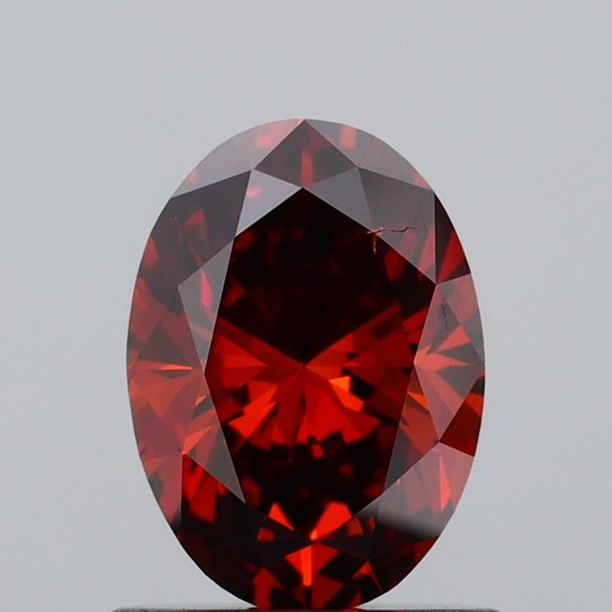Loose Diamond - OVAL 0.9ct Fancy Deep Orange VS1: Loose Diamond - OVAL 0.9ct Fancy Deep Orange VS1 Source: This is a real non-mined Diamond that has been grown in a lab Shape: OVAL Carats: 0.9 Color: Fancy Deep Orange Certification: IGI Video: