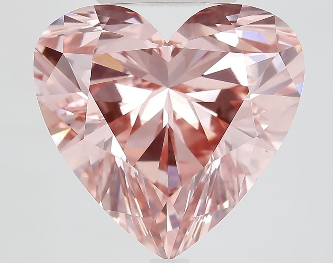 Loose Diamond - HEART 11.16ct Fancy Vivid Pink VS1: Loose Diamond - HEART 11.16ct Fancy Vivid Pink VS1 Source: This is a real non-mined Diamond that has been grown in a lab Shape: HEART Carats: 11.16 Color: Fancy Vivid Pink Certification: IGI Video: