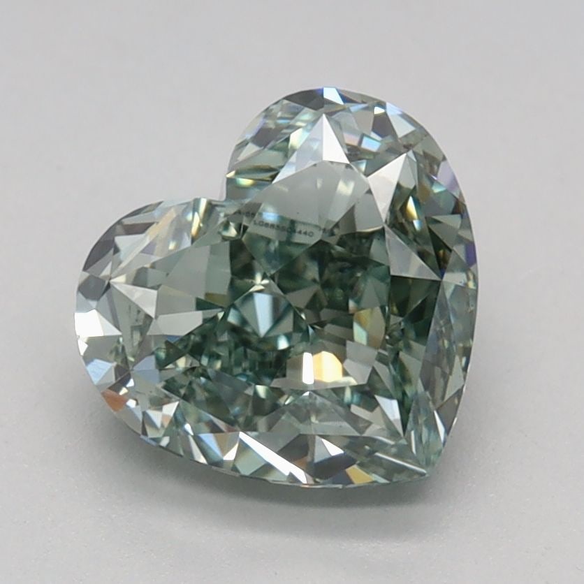 Loose Diamond - HEART 1.58ct Fancy Vivid Green VS1: Loose Diamond - HEART 1.58ct Fancy Vivid Green VS1 Source: This is a real non-mined Diamond that has been grown in a lab Shape: HEART Carats: 1.58 Color: Fancy Vivid Green Certification: IGI Video: