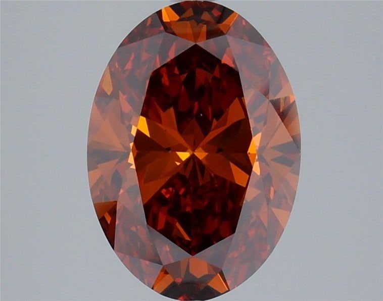 Loose Diamond - OVAL 4.01ct Fancy Vivid Orange VS1: Loose Diamond - OVAL 4.01ct Fancy Vivid Orange VS1 Source: This is a real non-mined Diamond that has been grown in a lab Shape: OVAL Carats: 4.01 Color: Fancy Vivid Orange Certification: IGI Video:
