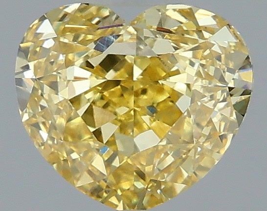 Loose Diamond - HEART 1.07ct Fancy Vivid Yellow VS1: Loose Diamond - HEART 1.07ct Fancy Vivid Yellow VS1 Source: This is a real non-mined Diamond that has been grown in a lab Shape: HEART Carats: 1.07 Color: Fancy Vivid Yellow Certification: IGI Video: