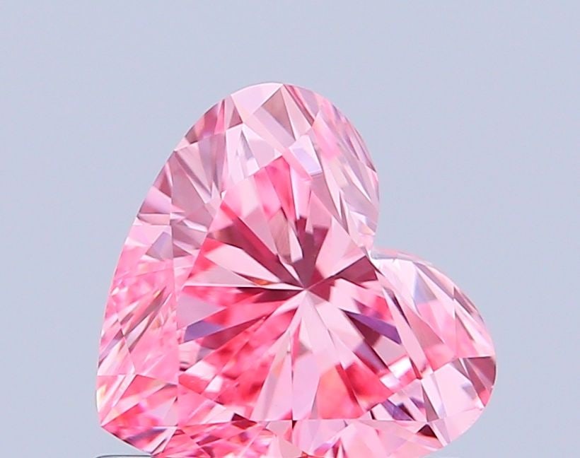 Loose Diamond - HEART 0.75ct Fancy Vivid Pink VVS2: Loose Diamond - HEART 0.75ct Fancy Vivid Pink VVS2 Source: This is a real non-mined Diamond that has been grown in a lab Shape: HEART Carats: 0.75 Color: Fancy Vivid Pink Certification: IGI Video: