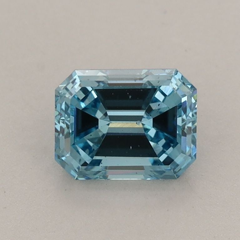 Loose Diamond - EMERALD 1.01ct Fancy Vivid Blue SI1: Loose Diamond - EMERALD 1.01ct Fancy Vivid Blue SI1 Source: This is a real non-mined Diamond that has been grown in a lab Shape: EMERALD Carats: 1.01 Color: Fancy Vivid Blue Certification: IGI Video:
