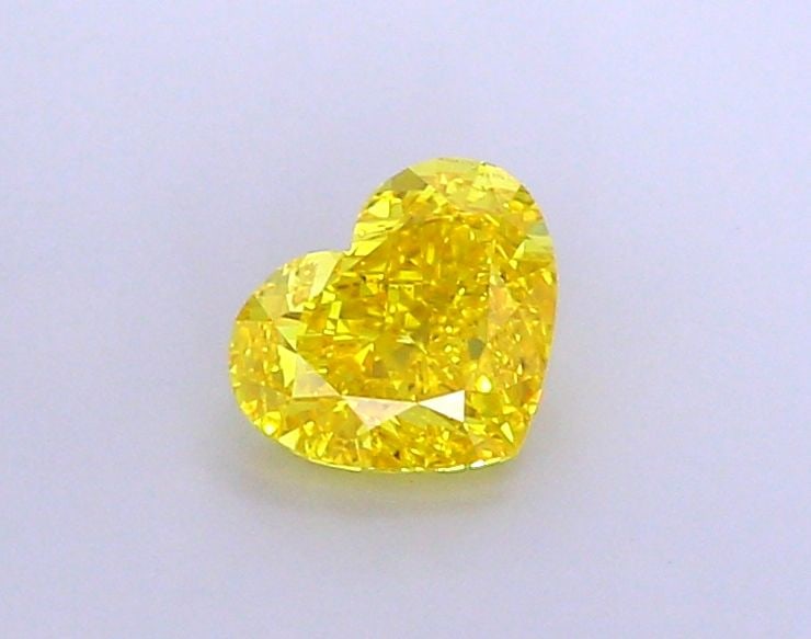 Loose Diamond - HEART 1.53ct Fancy Vivid Yellow VVS2: Loose Diamond - HEART 1.53ct Fancy Vivid Yellow VVS2 Source: This is a real non-mined Diamond that has been grown in a lab Shape: HEART Carats: 1.53 Color: Fancy Vivid Yellow Certification: IGI Video: