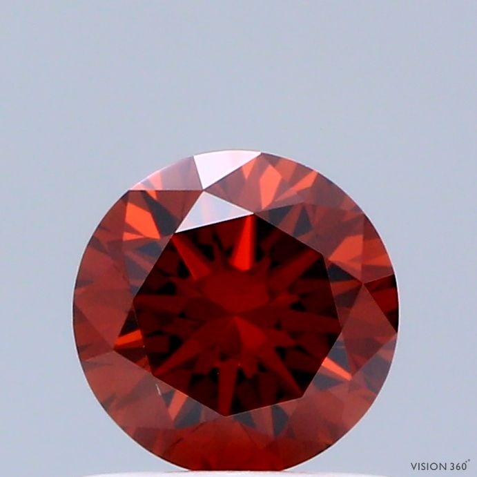 Loose Diamond - ROUND 0.66ct Fancy Deep Orange VS1: Loose Diamond - ROUND 0.66ct Fancy Deep Orange VS1 Source: This is a real non-mined Diamond that has been grown in a lab Shape: ROUND Carats: 0.66 Color: Fancy Deep Orange Certification: IGI Video: