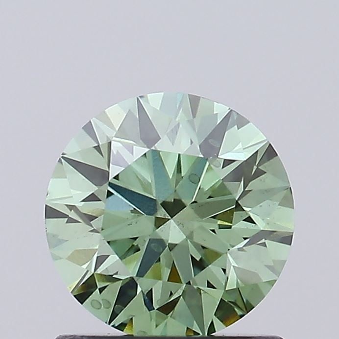 Loose Diamond - ROUND 1.0ct Fancy Vivid Green SI1: Loose Diamond - ROUND 1.0ct Fancy Vivid Green SI1 Source: This is a real non-mined Diamond that has been grown in a lab Shape: ROUND Carats: 1.0 Color: Fancy Vivid Green Certification: IGI Video:
