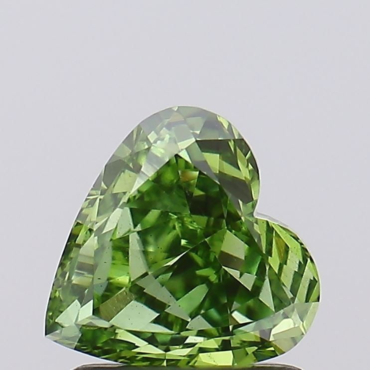 Loose Diamond - HEART 0.79ct Fancy Vivid Green VS2: Loose Diamond - HEART 0.79ct Fancy Vivid Green VS2 Source: This is a real non-mined Diamond that has been grown in a lab Shape: HEART Carats: 0.79 Color: Fancy Vivid Green Certification: NONE Video: