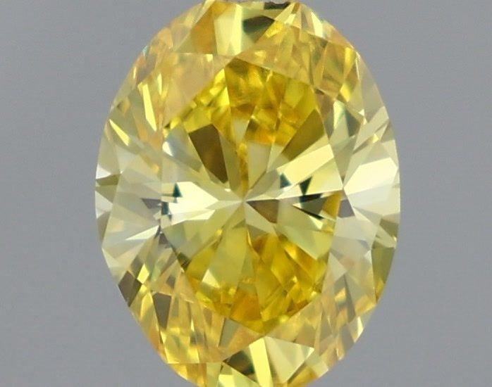 Loose Diamond - OVAL 0.55ct Fancy Vivid Yellow VVS2: Loose Diamond - OVAL 0.55ct Fancy Vivid Yellow VVS2 Source: This is a real non-mined Diamond that has been grown in a lab Shape: OVAL Carats: 0.55 Color: Fancy Vivid Yellow Certification: IGI Video: