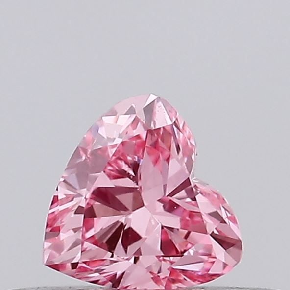 Loose Diamond - HEART 0.31ct Fancy Vivid Pink VS2: Loose Diamond - HEART 0.31ct Fancy Vivid Pink VS2 Source: This is a real non-mined Diamond that has been grown in a lab Shape: HEART Carats: 0.31 Color: Fancy Vivid Pink Certification: IGI Video: