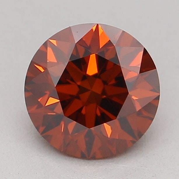Loose Diamond - ROUND 0.74ct Fancy Orange VS1: Loose Diamond - ROUND 0.74ct Fancy Orange VS1 Source: This is a real non-mined Diamond that has been grown in a lab Shape: ROUND Carats: 0.74 Color: Fancy Orange Certification: IGI Video: