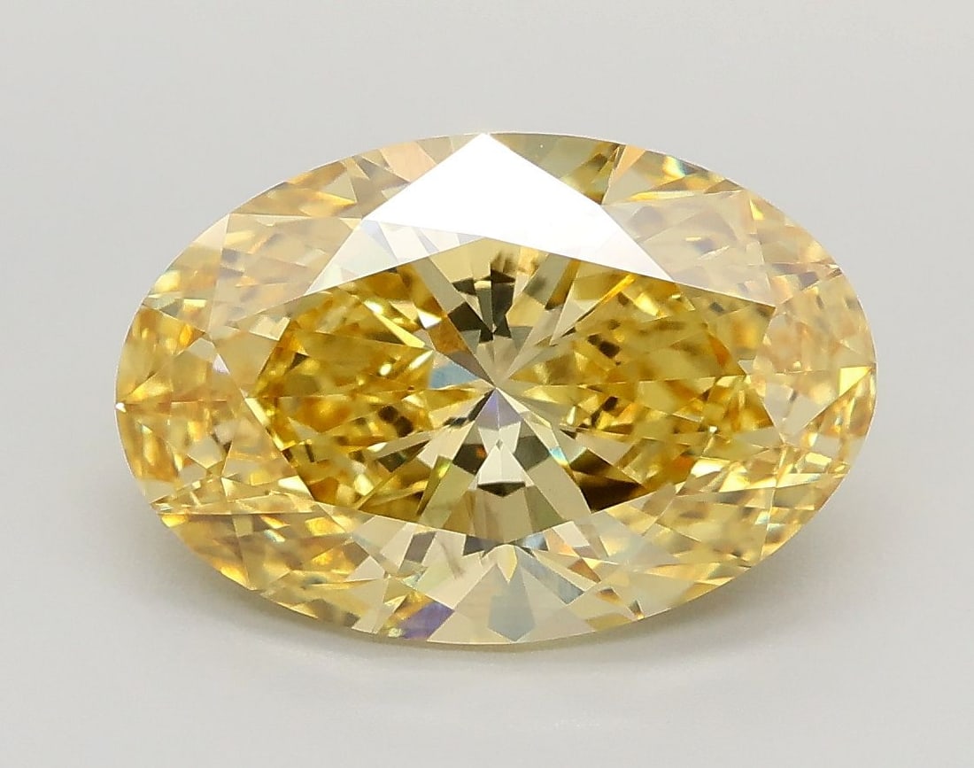 Loose Diamond - OVAL 3.02ct Fancy Vivid Yellow VS2: Loose Diamond - OVAL 3.02ct Fancy Vivid Yellow VS2 Source: This is a real non-mined Diamond that has been grown in a lab Shape: OVAL Carats: 3.02 Color: Fancy Vivid Yellow Certification: IGI Video: