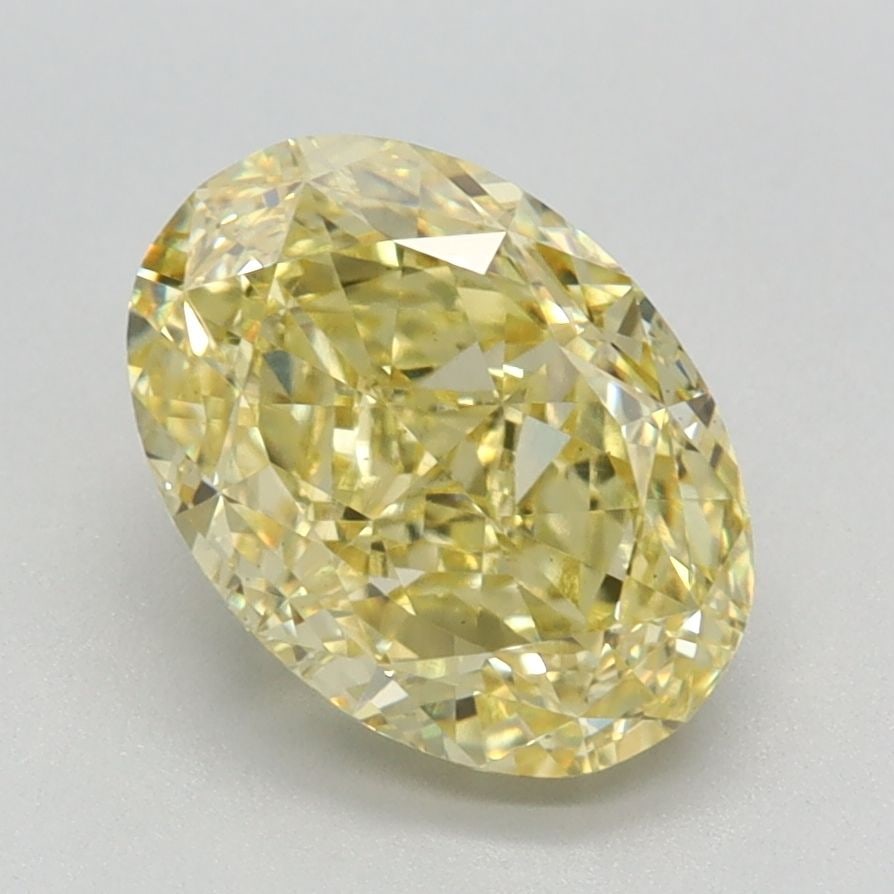 Loose Diamond - OVAL 2.15ct Fancy Vivid Yellow VS1: Loose Diamond - OVAL 2.15ct Fancy Vivid Yellow VS1 Source: This is a real non-mined Diamond that has been grown in a lab Shape: OVAL Carats: 2.15 Color: Fancy Vivid Yellow Certification: IGI Video: