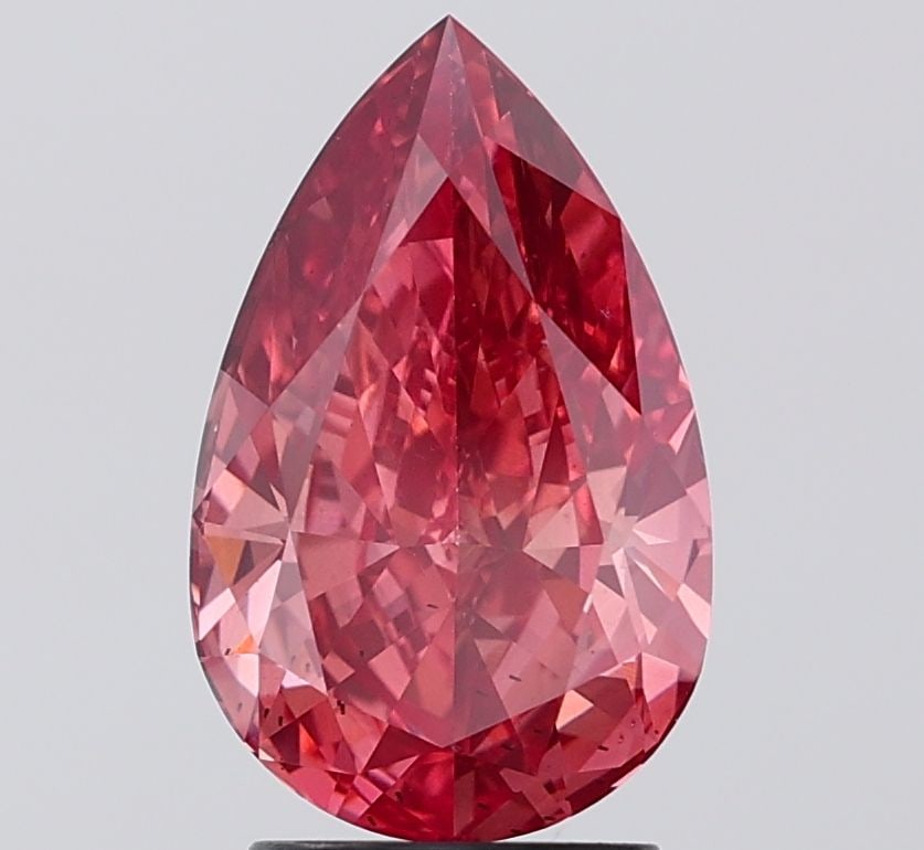 Loose Diamond - PEAR 3.04ct Fancy Vivid Brownish Pink VS2: Loose Diamond - PEAR 3.04ct Fancy Vivid Brownish Pink VS2 Source: This is a real non-mined Diamond that has been grown in a lab Shape: PEAR Carats: 3.04 Color: Fancy Vivid Brownish Pink Certification:
