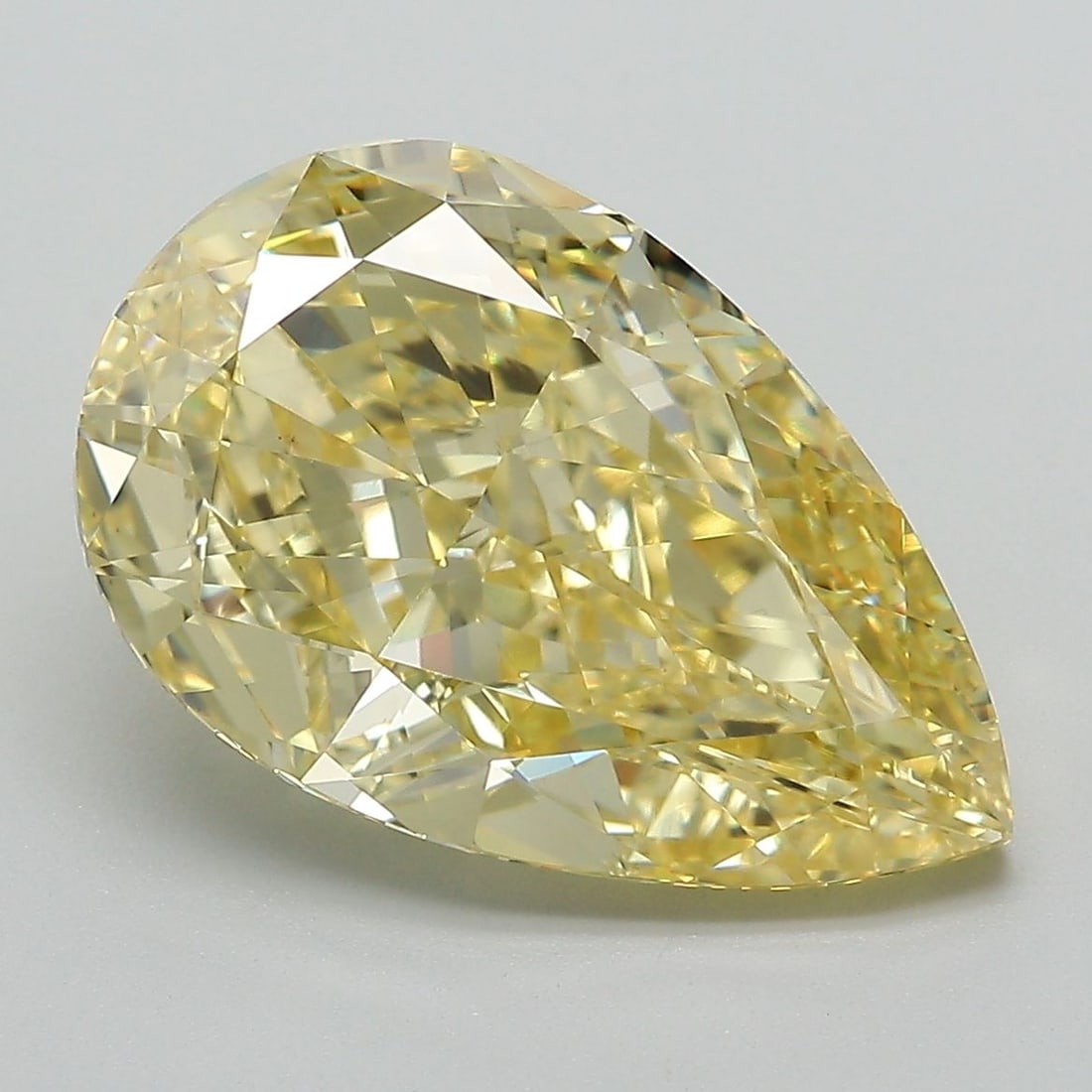 Loose Diamond - PEAR 6.49ct Fancy Intense Yellow VS1: Loose Diamond - PEAR 6.49ct Fancy Intense Yellow VS1 Source: This is a real non-mined Diamond that has been grown in a lab Shape: PEAR Carats: 6.49 Color: Fancy Intense Yellow Certification: IGI Video