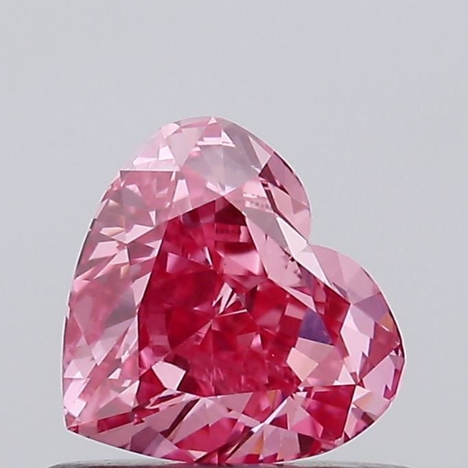 Loose Diamond - HEART 0.72ct Fancy Vivid Pink VS1: Loose Diamond - HEART 0.72ct Fancy Vivid Pink VS1 Source: This is a real non-mined Diamond that has been grown in a lab Shape: HEART Carats: 0.72 Color: Fancy Vivid Pink Certification: IGI Video: