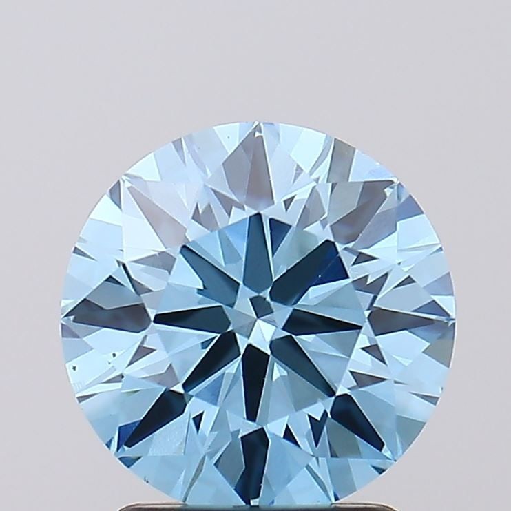 Loose Diamond - ROUND 2.04ct Fancy Vivid Blue VS1: Loose Diamond - ROUND 2.04ct Fancy Vivid Blue VS1 Source: This is a real non-mined Diamond that has been grown in a lab Shape: ROUND Carats: 2.04 Color: Fancy Vivid Blue Certification: IGI Video: