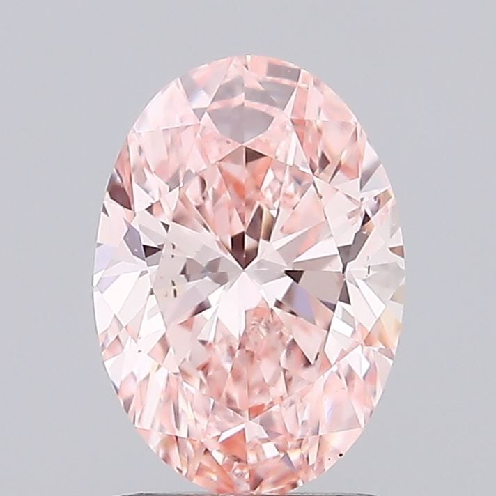 Loose Diamond - OVAL 1.42ct Fancy Vivid Pink VS2: Loose Diamond - OVAL 1.42ct Fancy Vivid Pink VS2 Source: This is a real non-mined Diamond that has been grown in a lab Shape: OVAL Carats: 1.42 Color: Fancy Vivid Pink Certification: IGI Video: