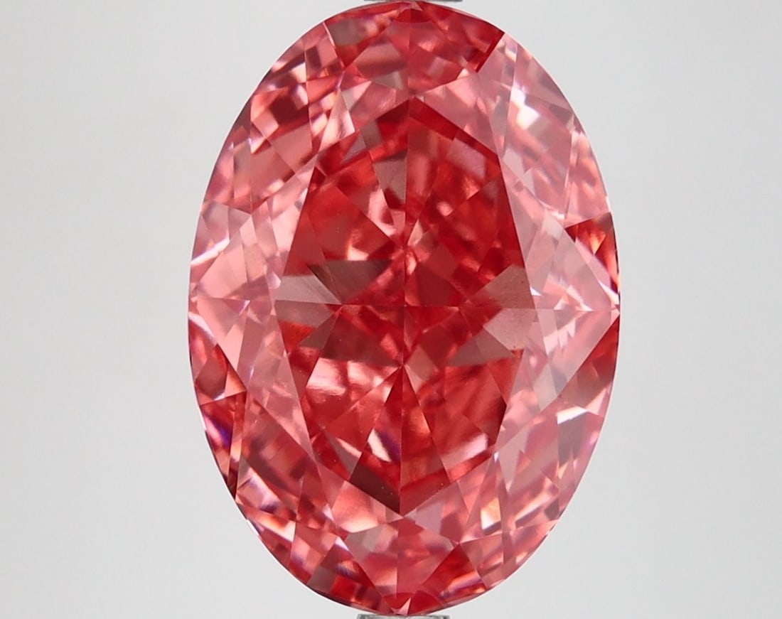 Loose Diamond - OVAL 5.55ct Fancy Vivid Pink VS1: Loose Diamond - OVAL 5.55ct Fancy Vivid Pink VS1 Source: This is a real non-mined Diamond that has been grown in a lab Shape: OVAL Carats: 5.55 Color: Fancy Vivid Pink Certification: IGI Video: