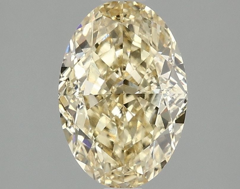 Loose Diamond - OVAL 2.09ct Fancy Vivid Yellow VVS2: Loose Diamond - OVAL 2.09ct Fancy Vivid Yellow VVS2 Source: This is a real non-mined Diamond that has been grown in a lab Shape: OVAL Carats: 2.09 Color: Fancy Vivid Yellow Certification: IGI Video: