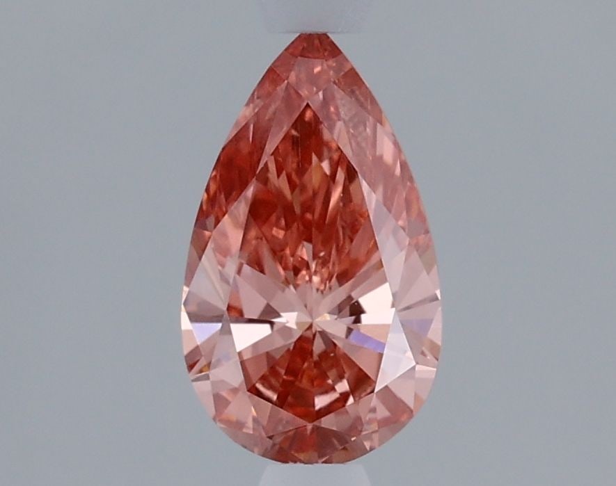 Loose Diamond - PEAR 1.04ct Fancy Vivid Pink VS1: Loose Diamond - PEAR 1.04ct Fancy Vivid Pink VS1 Source: This is a real non-mined Diamond that has been grown in a lab Shape: PEAR Carats: 1.04 Color: Fancy Vivid Pink Certification: IGI Video: