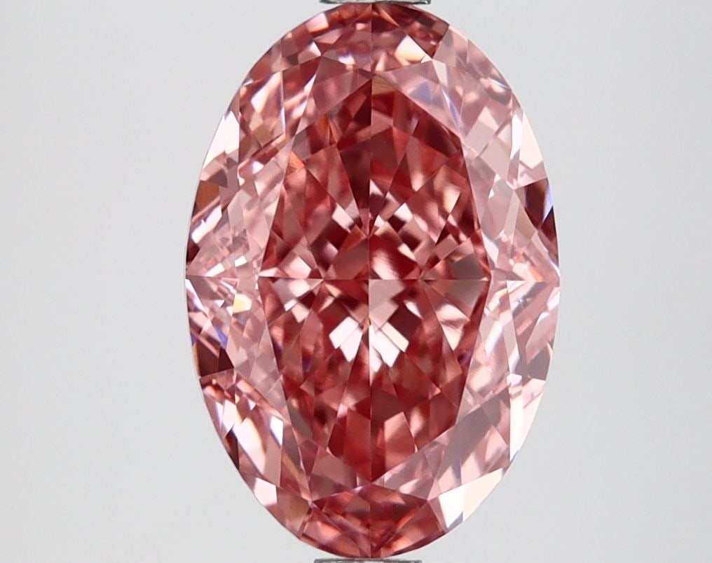 Loose Diamond - OVAL 2.76ct Fancy Vivid Pink VVS2: Loose Diamond - OVAL 2.76ct Fancy Vivid Pink VVS2 Source: This is a real non-mined Diamond that has been grown in a lab Shape: OVAL Carats: 2.76 Color: Fancy Vivid Pink Certification: IGI Video: