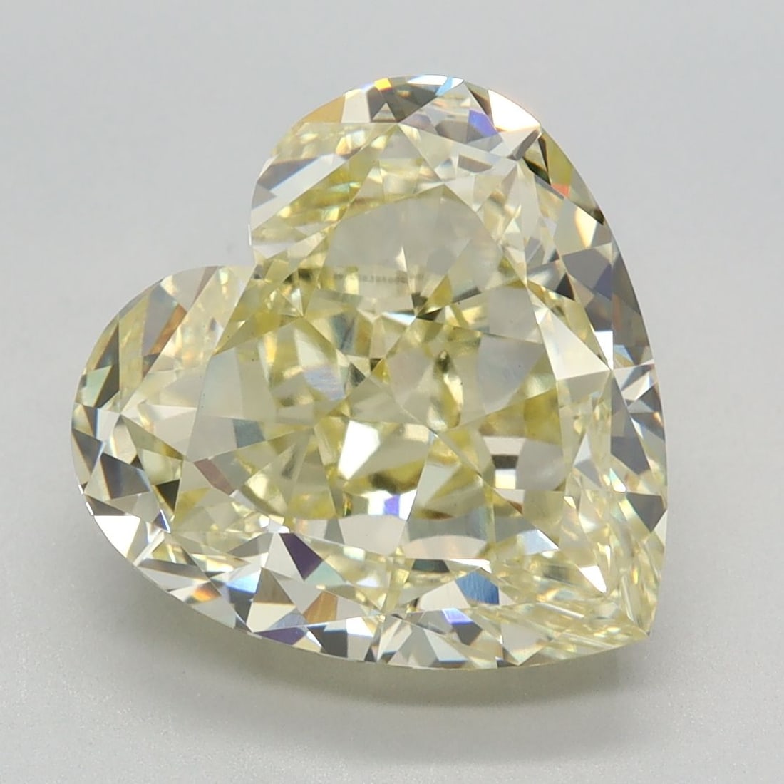 Loose Diamond - HEART 5.77ct Fancy Yellow VS1: Loose Diamond - HEART 5.77ct Fancy Yellow VS1 Source: This is a real non-mined Diamond that has been grown in a lab Shape: HEART Carats: 5.77 Color: Fancy Yellow Certification: IGI Video: Video Link