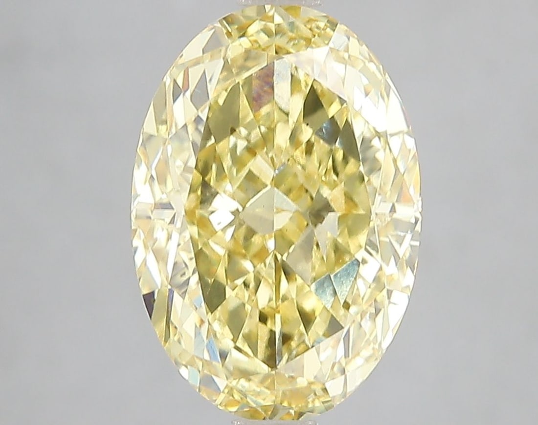 Loose Diamond - OVAL 5.02ct Fancy Vivid Yellow VS1: Loose Diamond - OVAL 5.02ct Fancy Vivid Yellow VS1 Source: This is a real non-mined Diamond that has been grown in a lab Shape: OVAL Carats: 5.02 Color: Fancy Vivid Yellow Certification: IGI Video: