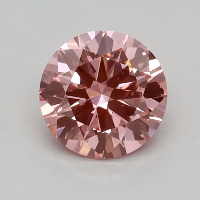 Loose Diamond - ROUND 0.37ct Fancy Vivid Pink VVS2: Loose Diamond - ROUND 0.37ct Fancy Vivid Pink VVS2 Source: This is a real non-mined Diamond that has been grown in a lab Shape: ROUND Carats: 0.37 Color: Fancy Vivid Pink Certification: IGI Video:
