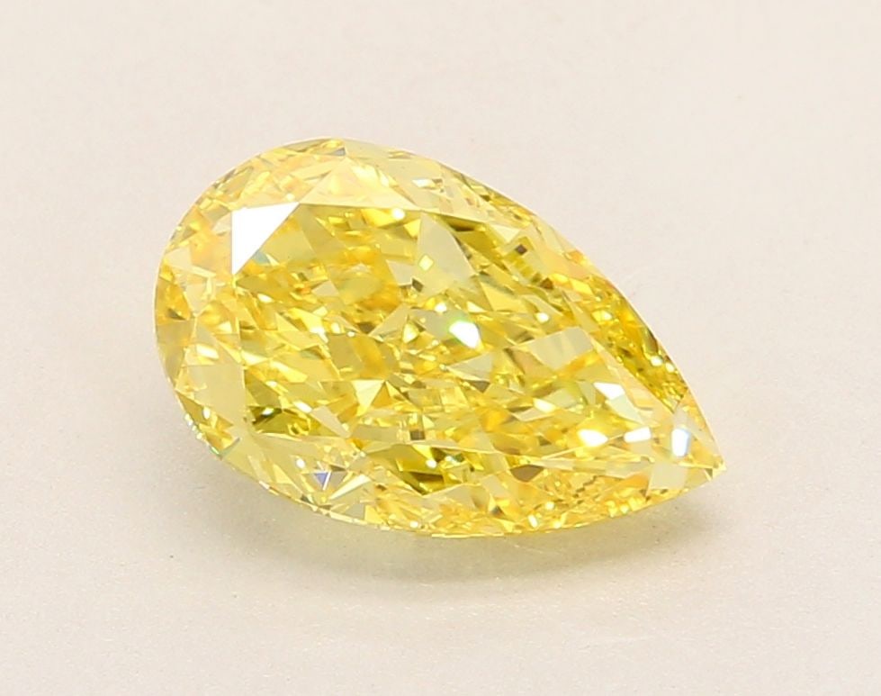 Loose Diamond - PEAR 2.64ct Fancy Vivid Yellow VS1: Loose Diamond - PEAR 2.64ct Fancy Vivid Yellow VS1 Source: This is a real non-mined Diamond that has been grown in a lab Shape: PEAR Carats: 2.64 Color: Fancy Vivid Yellow Certification: IGI Video: