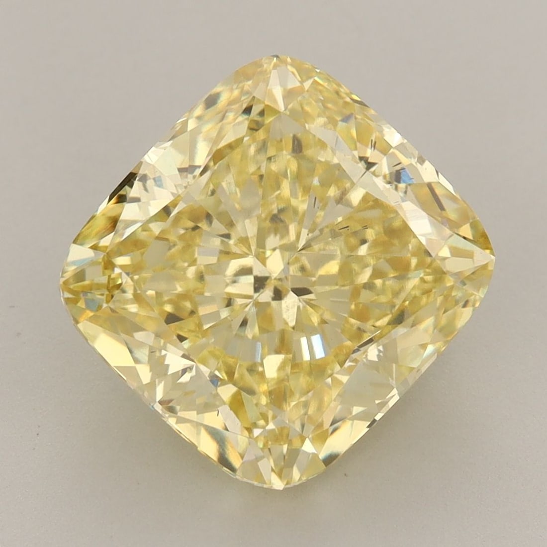 Loose Diamond - CUSHION MODIFIED 6.08ct Fancy Intense Yellow VS2: Loose Diamond - CUSHION MODIFIED 6.08ct Fancy Intense Yellow VS2 Source: This is a real non-mined Diamond that has been grown in a lab Shape: CUSHION MODIFIED Carats: 6.08 Color: Fancy Intense