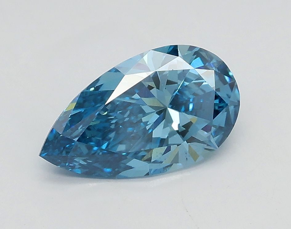 Loose Diamond - PEAR 1.01ct Fancy Vivid Blue VS2: Loose Diamond - PEAR 1.01ct Fancy Vivid Blue VS2 Source: This is a real non-mined Diamond that has been grown in a lab Shape: PEAR Carats: 1.01 Color: Fancy Vivid Blue Certification: IGI Video: