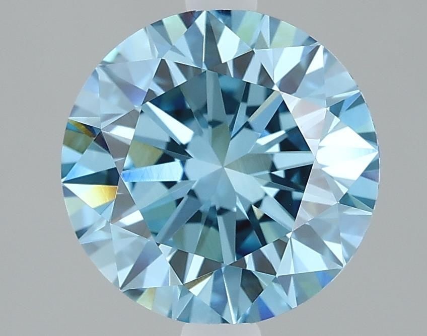 Loose Diamond - ROUND 2.11ct Fancy Vivid Blue VVS2: Loose Diamond - ROUND 2.11ct Fancy Vivid Blue VVS2 Source: This is a real non-mined Diamond that has been grown in a lab Shape: ROUND Carats: 2.11 Color: Fancy Vivid Blue Certification: IGI Video: