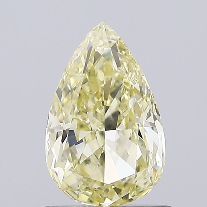 Loose Diamond - PEAR 0.87ct Fancy Light Yellow VVS2: Loose Diamond - PEAR 0.87ct Fancy Light Yellow VVS2 Source: This is a real non-mined Diamond that has been grown in a lab Shape: PEAR Carats: 0.87 Color: Fancy Light Yellow Certification: IGI Video: