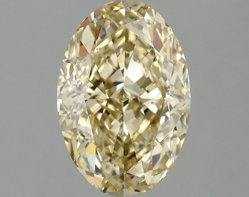 Loose Diamond - OVAL 2.1ct Fancy Intense Yellow VVS2: Loose Diamond - OVAL 2.1ct Fancy Intense Yellow VVS2 Source: This is a real non-mined Diamond that has been grown in a lab Shape: OVAL Carats: 2.1 Color: Fancy Intense Yellow Certification: IGI