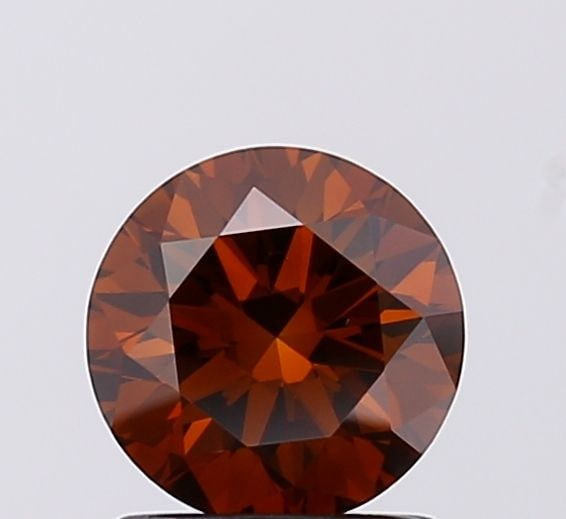 Loose Diamond - ROUND 1.09ct Fancy Deep Brown VS1: Loose Diamond - ROUND 1.09ct Fancy Deep Brown VS1 Source: This is a real non-mined Diamond that has been grown in a lab Shape: ROUND Carats: 1.09 Color: Fancy Deep Brown Certification: IGI The Diamond