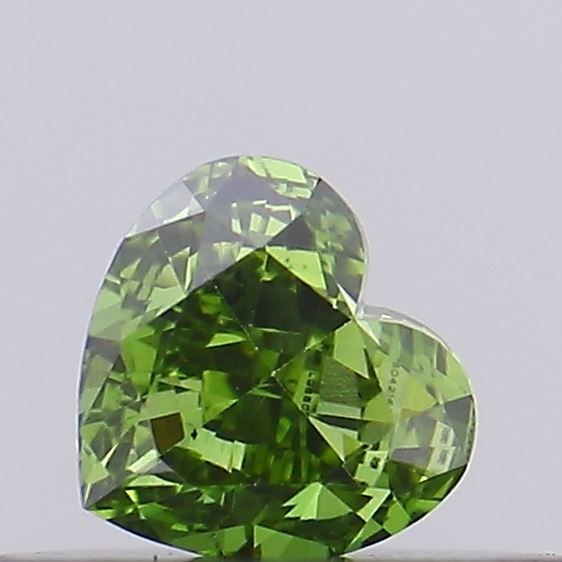Loose Diamond - HEART 0.22ct Fancy Vivid Green VS1: Loose Diamond - HEART 0.22ct Fancy Vivid Green VS1 Source: This is a real non-mined Diamond that has been grown in a lab Shape: HEART Carats: 0.22 Color: Fancy Vivid Green Certification: IGI Video:
