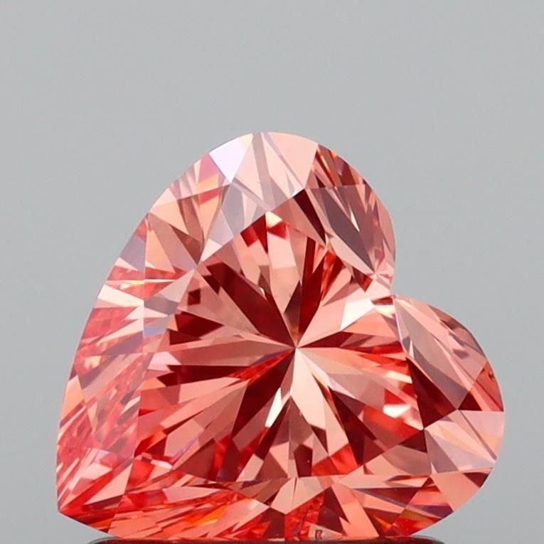 Loose Diamond - HEART 1.21ct Fancy Vivid Orange Pink VS2: Loose Diamond - HEART 1.21ct Fancy Vivid Orange Pink VS2 Source: This is a real non-mined Diamond that has been grown in a lab Shape: HEART Carats: 1.21 Color: Fancy Vivid Orange Pink Certification: I