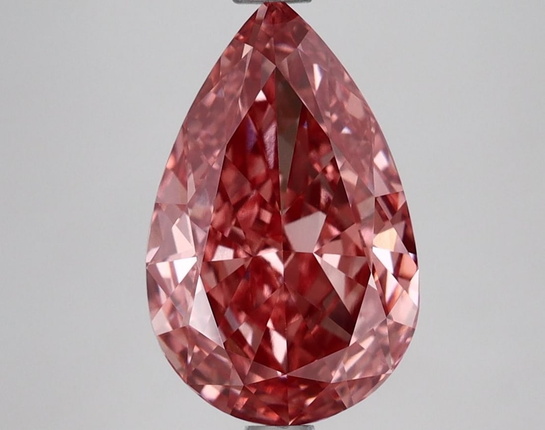 Loose Diamond - PEAR 3.08ct Fancy Vivid Pink VVS2: Loose Diamond - PEAR 3.08ct Fancy Vivid Pink VVS2 Source: This is a real non-mined Diamond that has been grown in a lab Shape: PEAR Carats: 3.08 Color: Fancy Vivid Pink Certification: IGI Video: