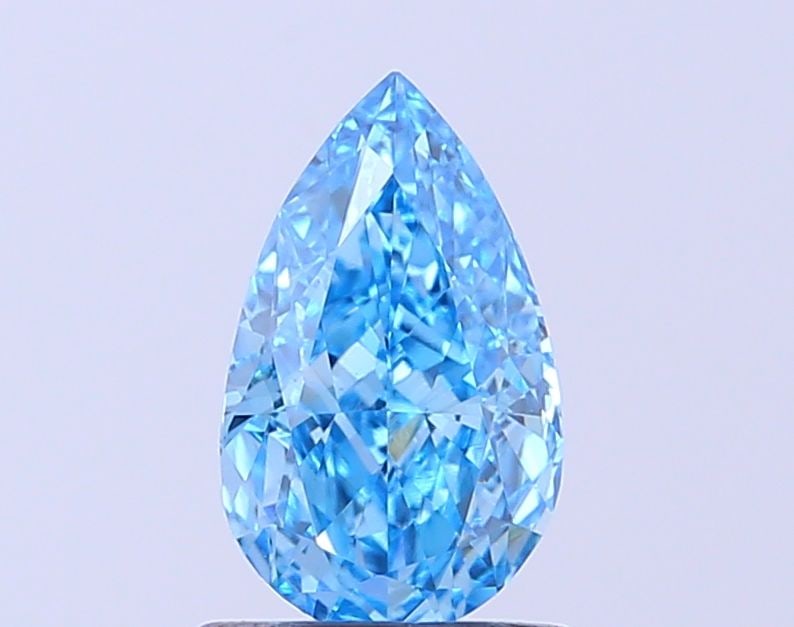 Loose Diamond - PEAR 0.97ct Fancy Vivid Blue VS1: Loose Diamond - PEAR 0.97ct Fancy Vivid Blue VS1 Source: This is a real non-mined Diamond that has been grown in a lab Shape: PEAR Carats: 0.97 Color: Fancy Vivid Blue Certification: IGI Video: